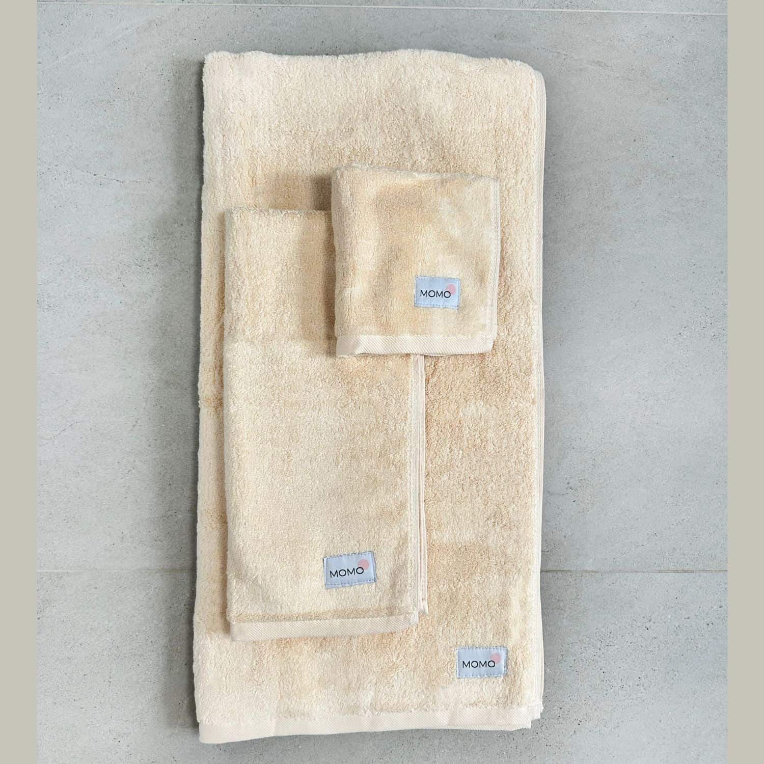 Three-piece beige bamboo towel set – bath, hand and face towels, soft, absorbent and sustainable