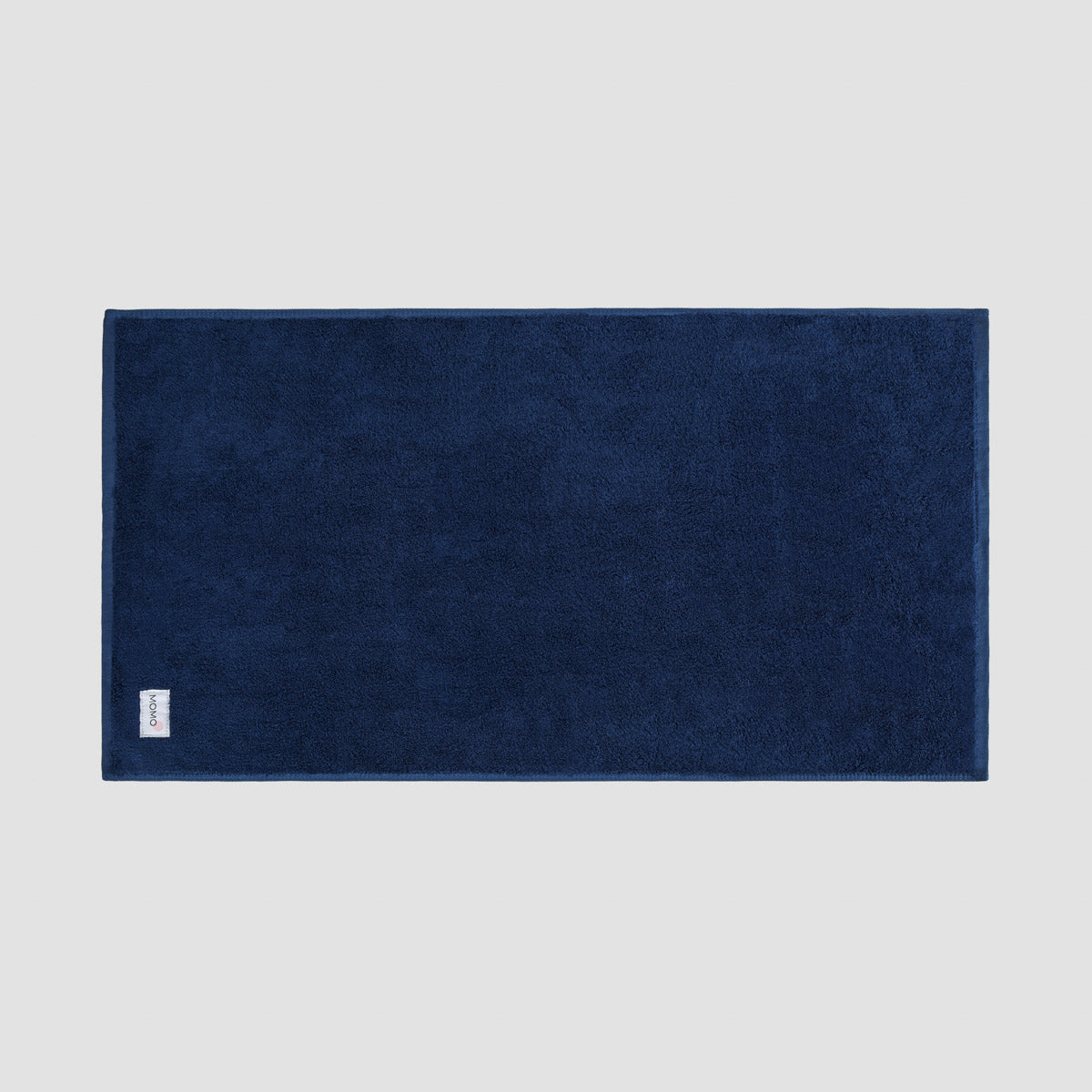 Tapete de banho blue navy em bambu da Momo Cotton – suave, absorvente, seca rapidamente e sustentável.